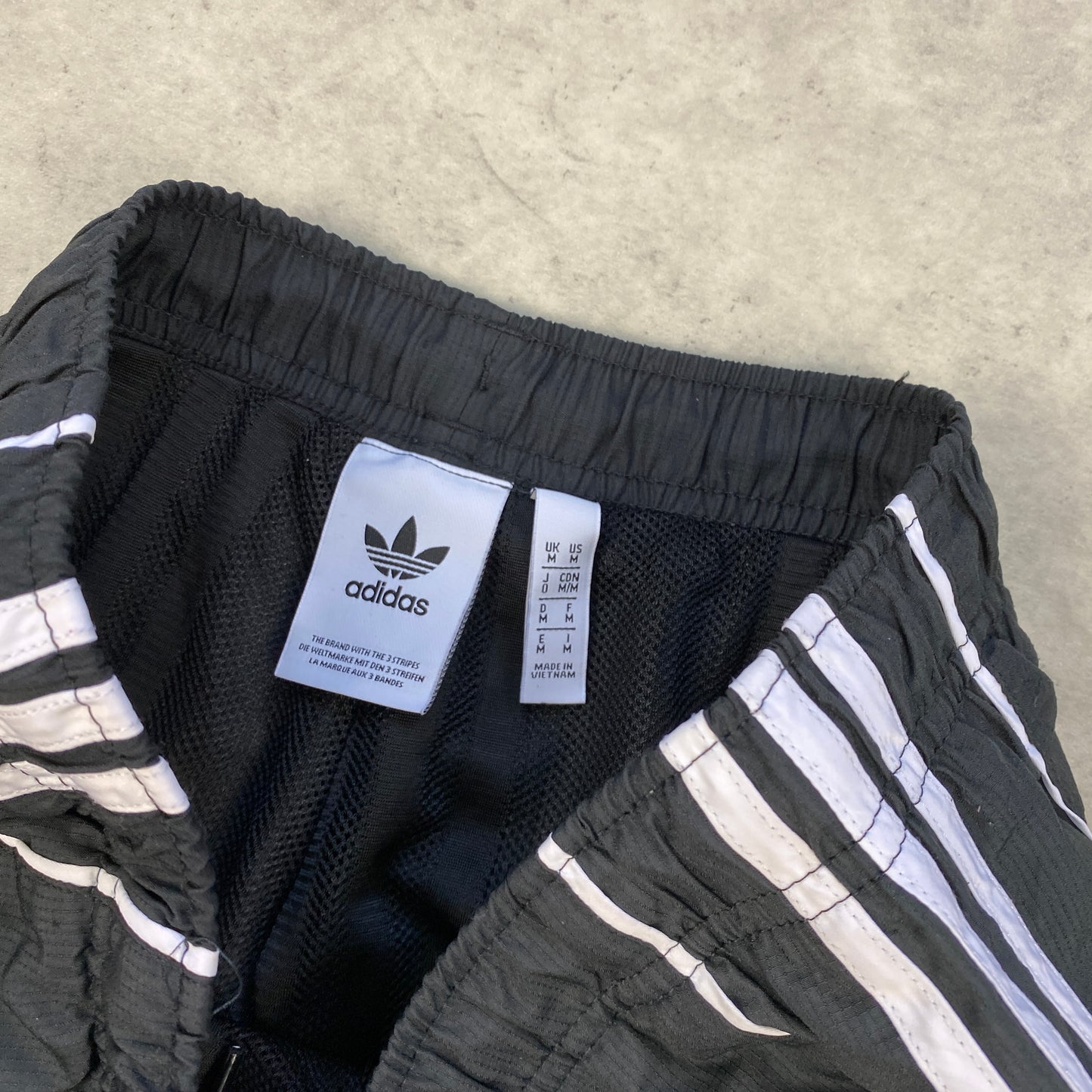 Adidas track pants (M)