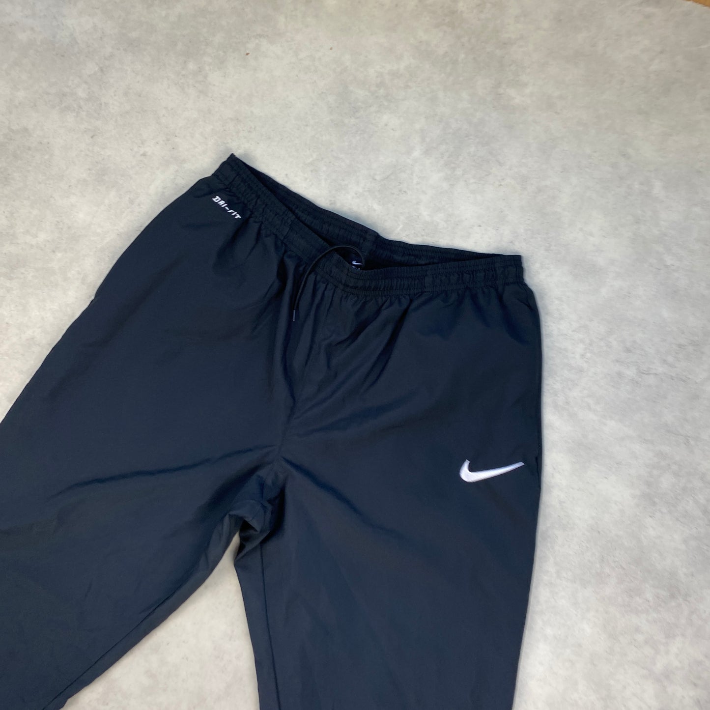 Nike track pants (L-XL)