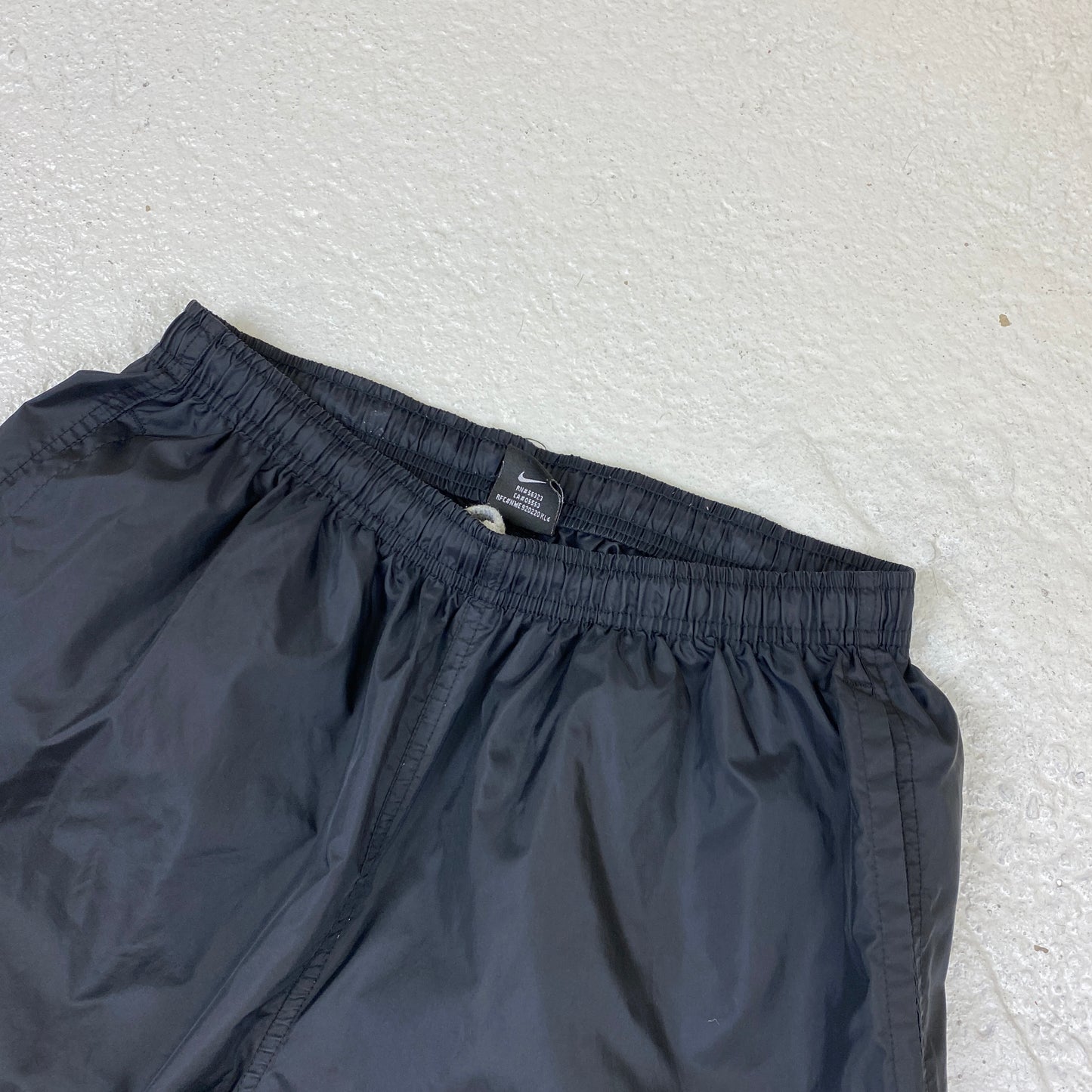 Nike embroidered track pants (L)