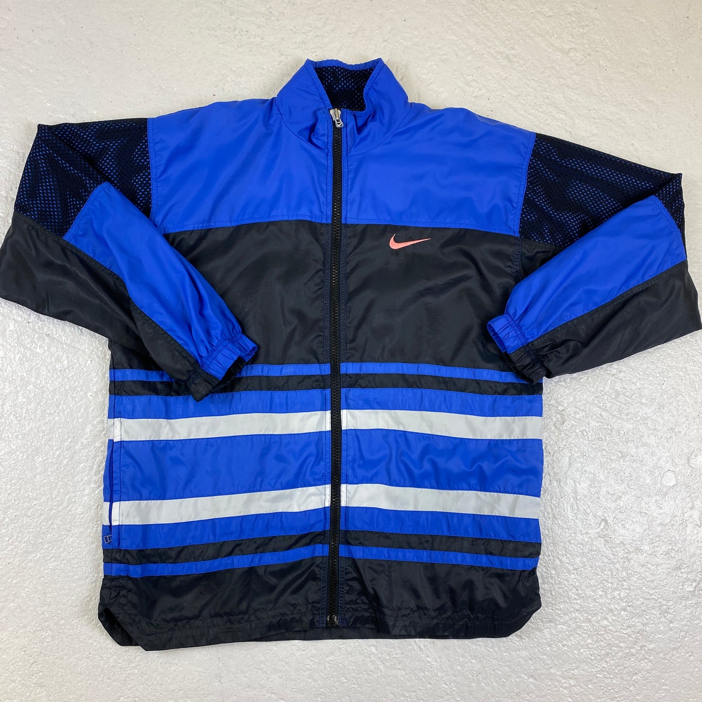 Nike RARE embroidered swoosh track jacket (M)