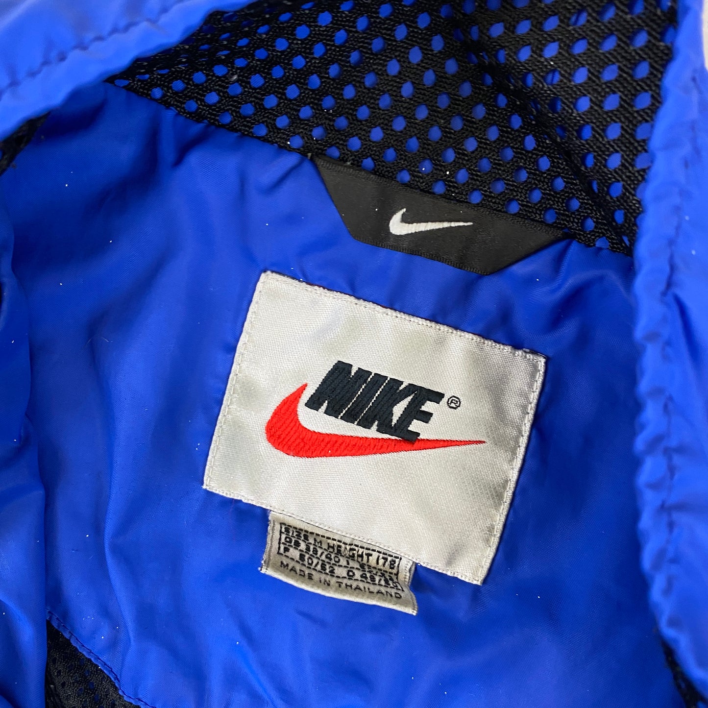 Nike RARE embroidered swoosh track jacket (M)