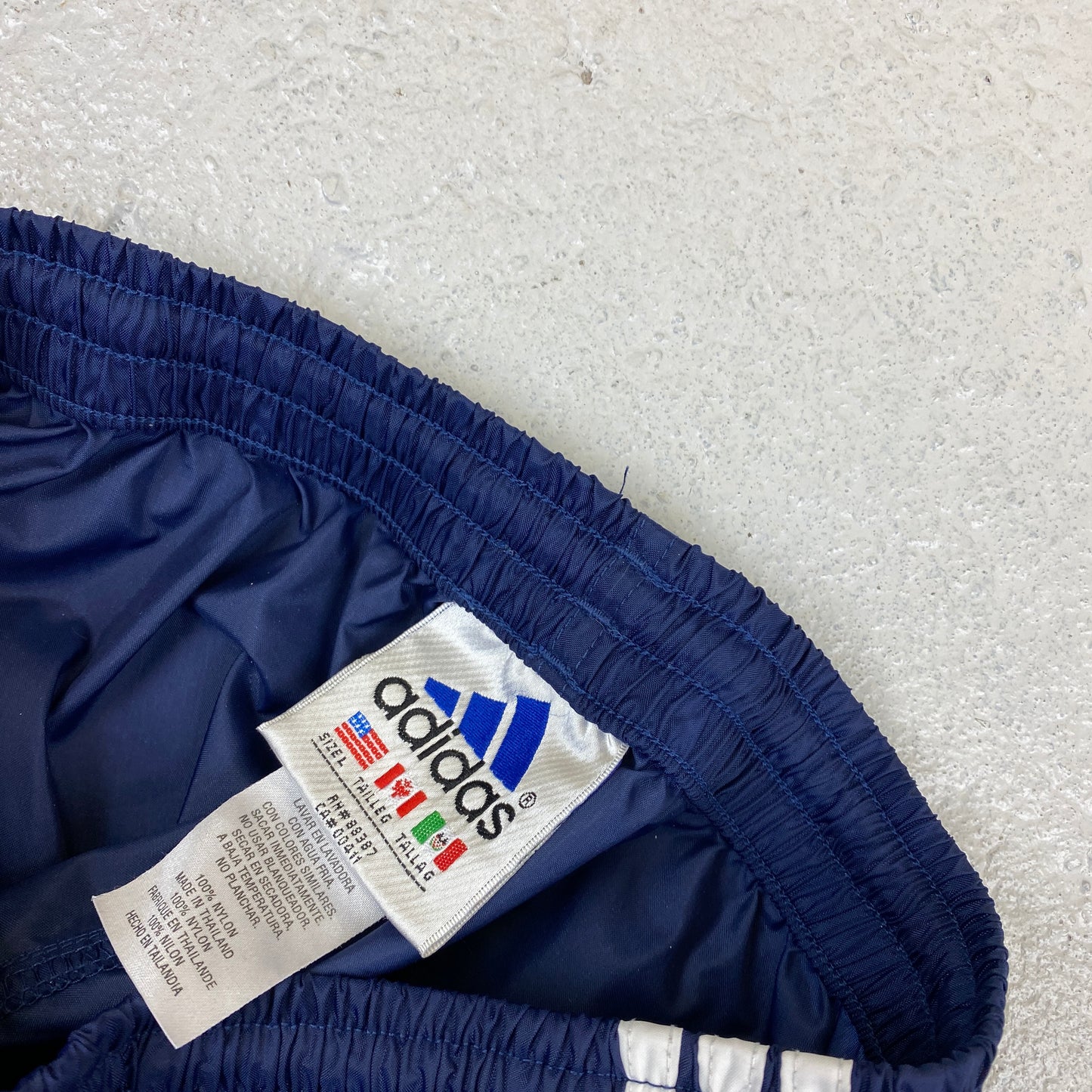 Adidas RARE embroidered track pants (S-M)