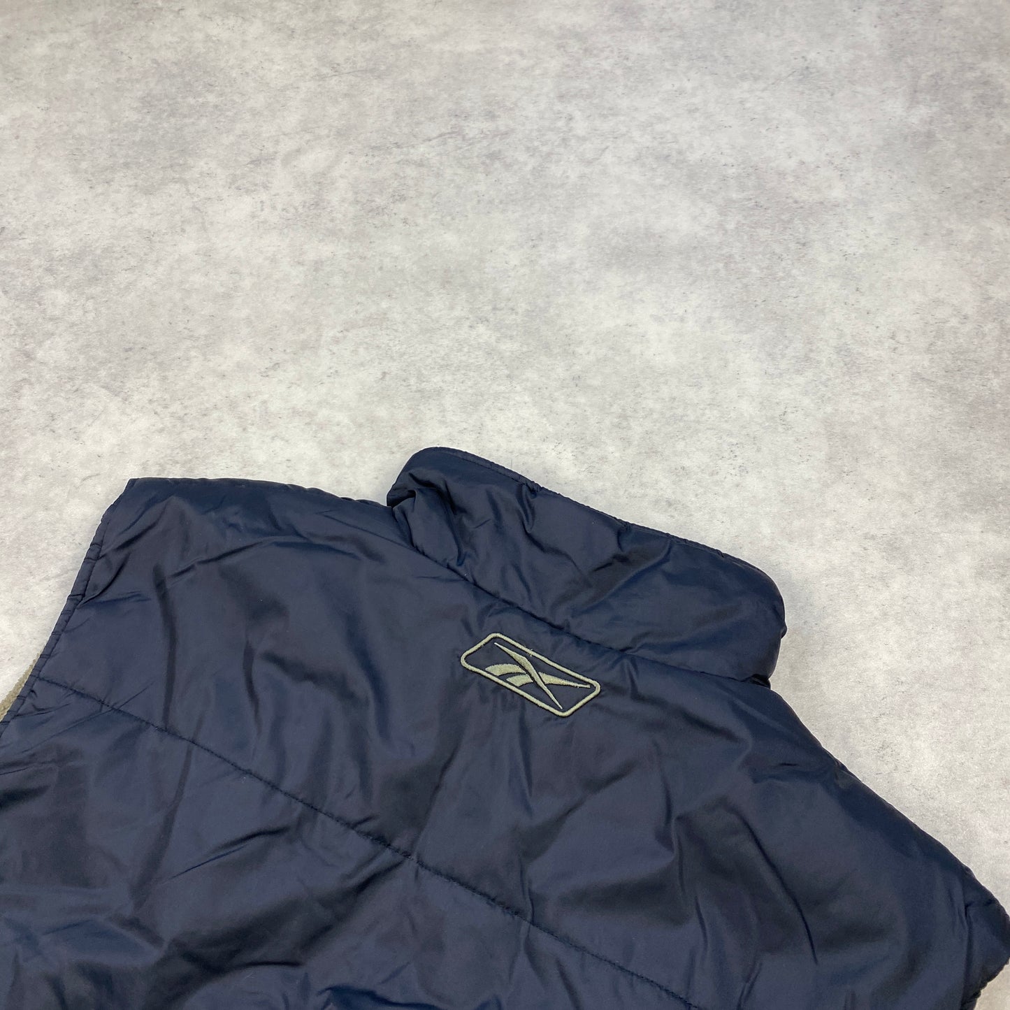 Reebok puffer vest (L)