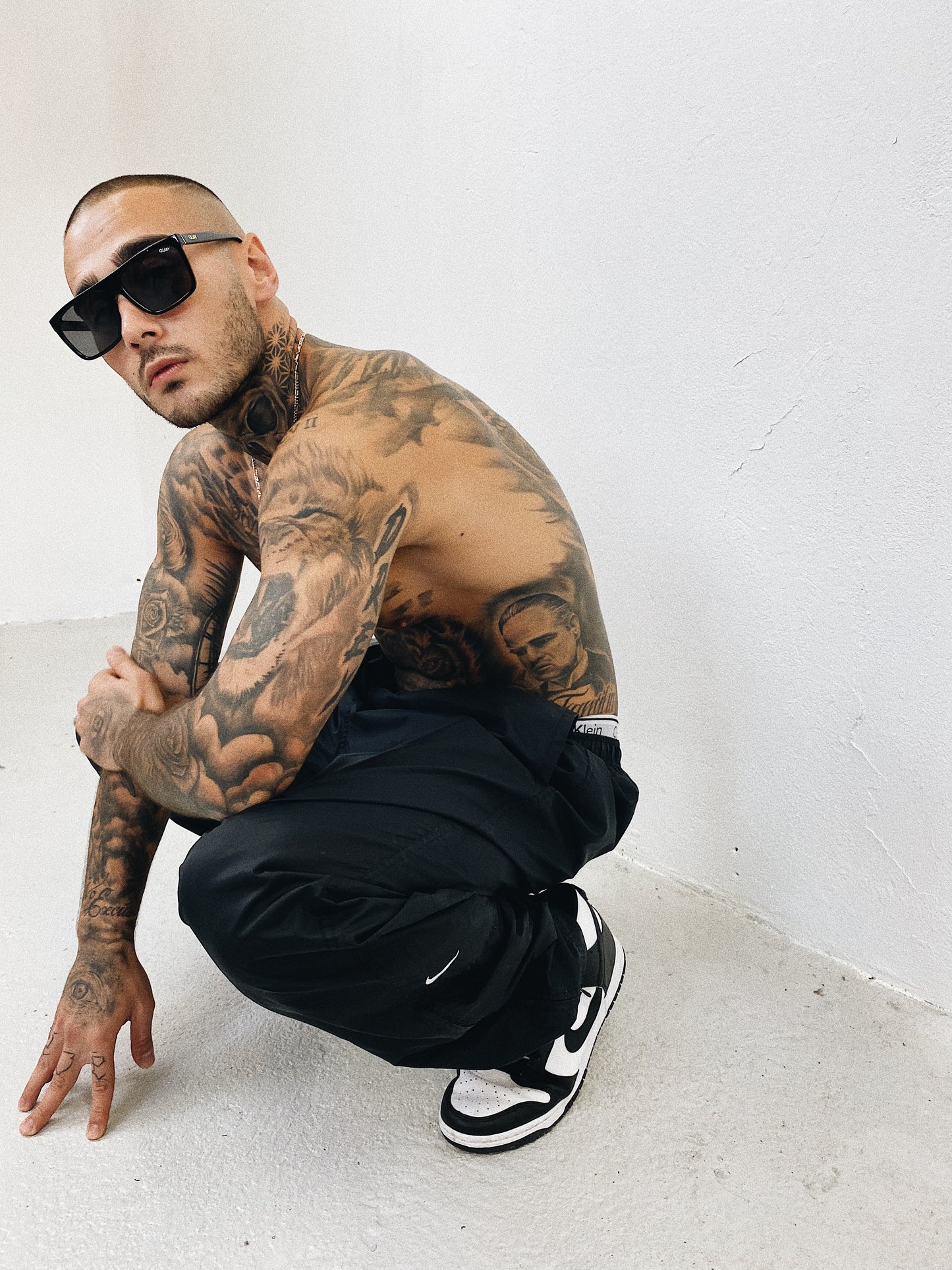 Nike embroidered track pants (L)