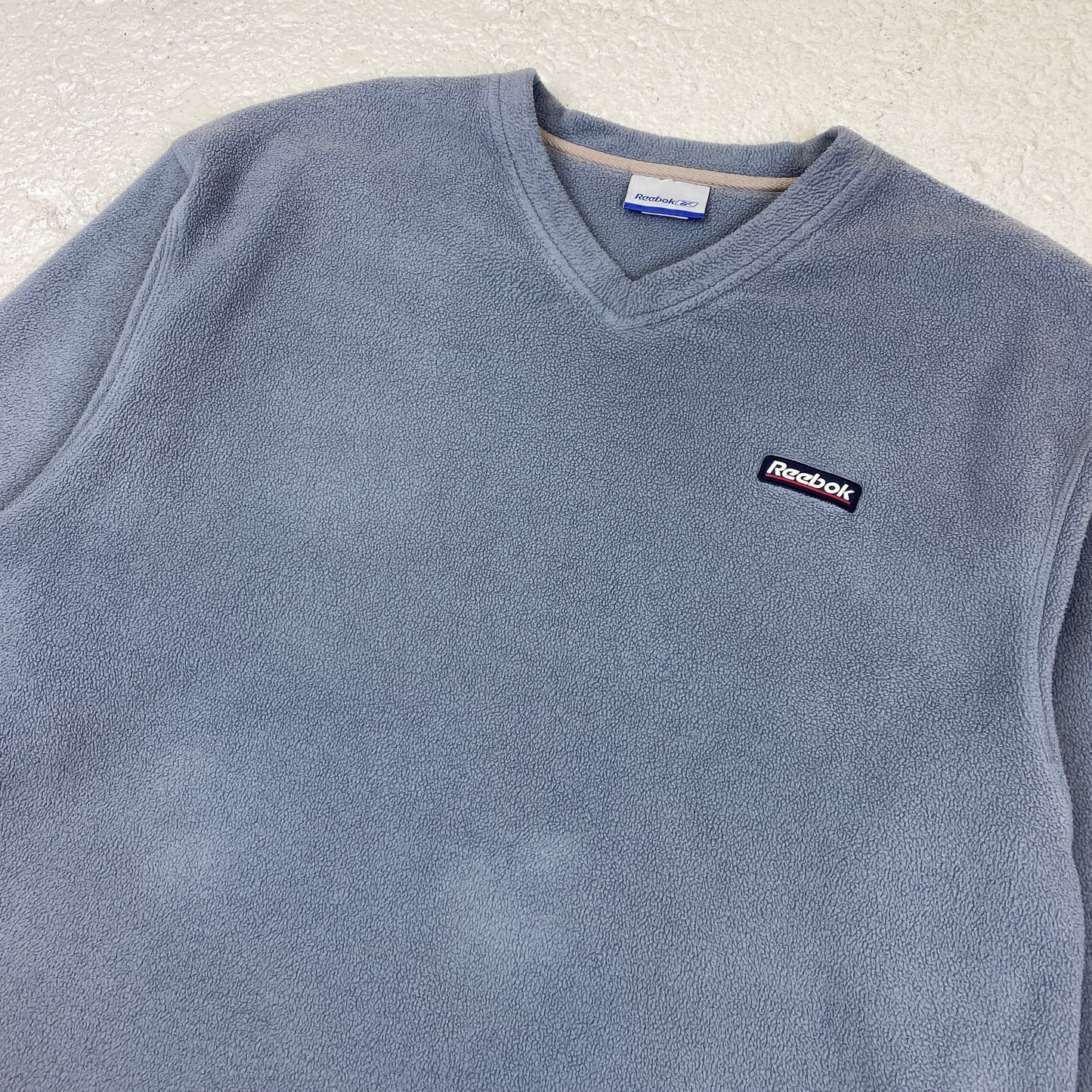 Reebok fleece v-neck sweater (L)