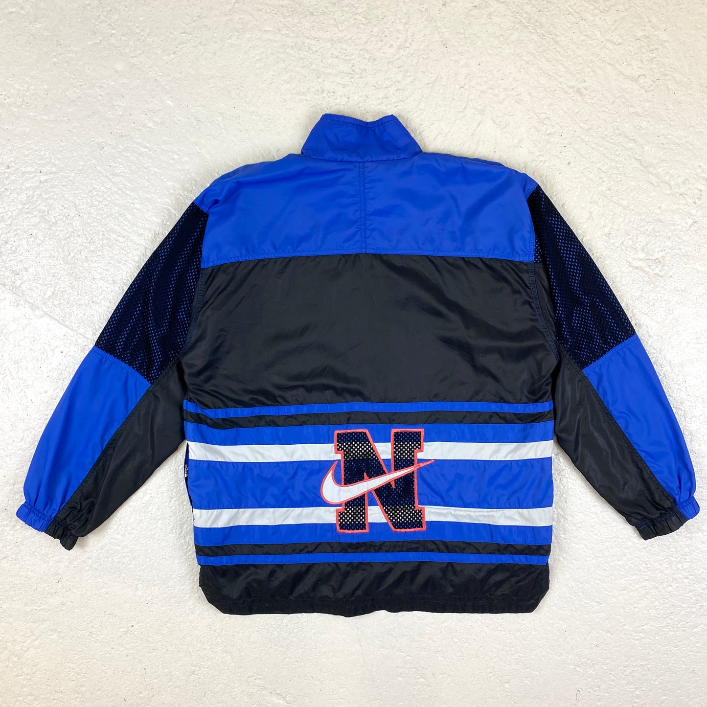 Nike RARE embroidered swoosh track jacket (M)