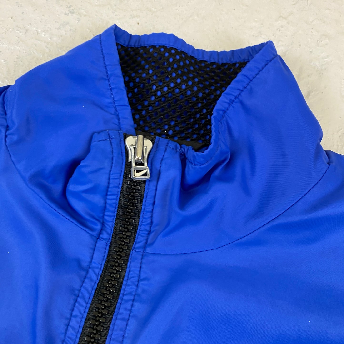 Nike RARE embroidered swoosh track jacket (M)