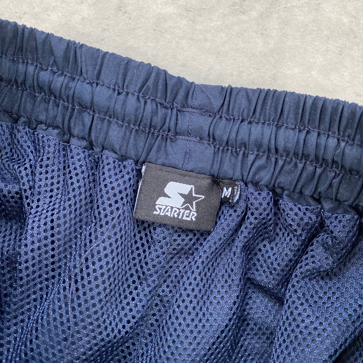 Starter track pants (M)