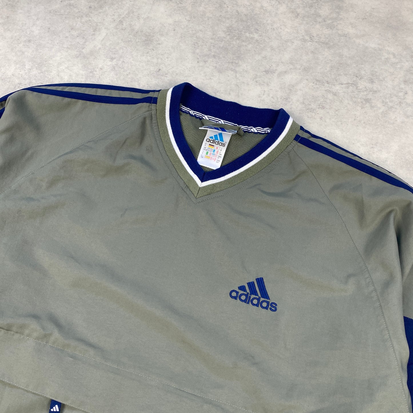 Adidas RARE v-neck windbreaker (S)