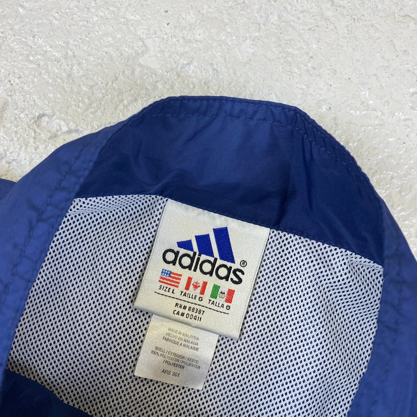 Adidas embroidered windbreaker (L-XL)