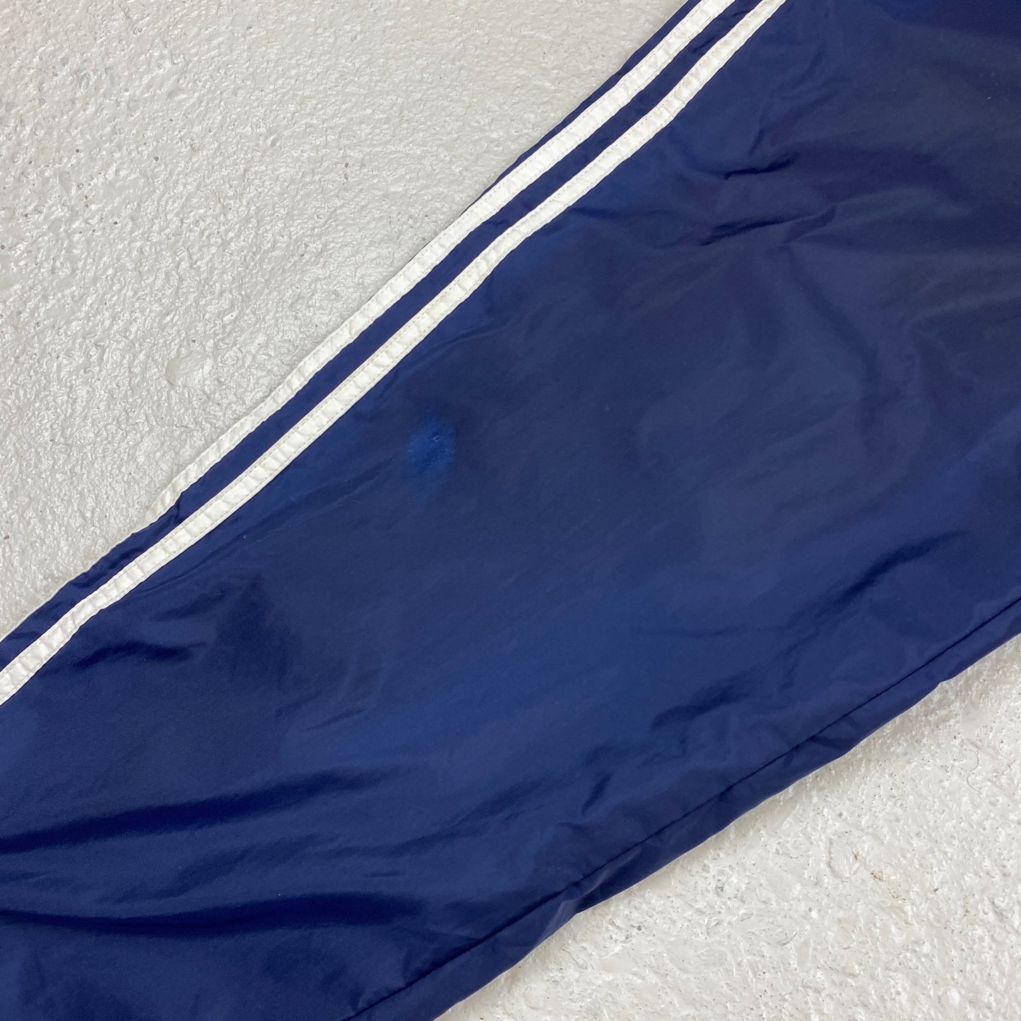 Adidas RARE embroidered track pants (S-M)