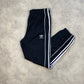 Adidas track pants (M)