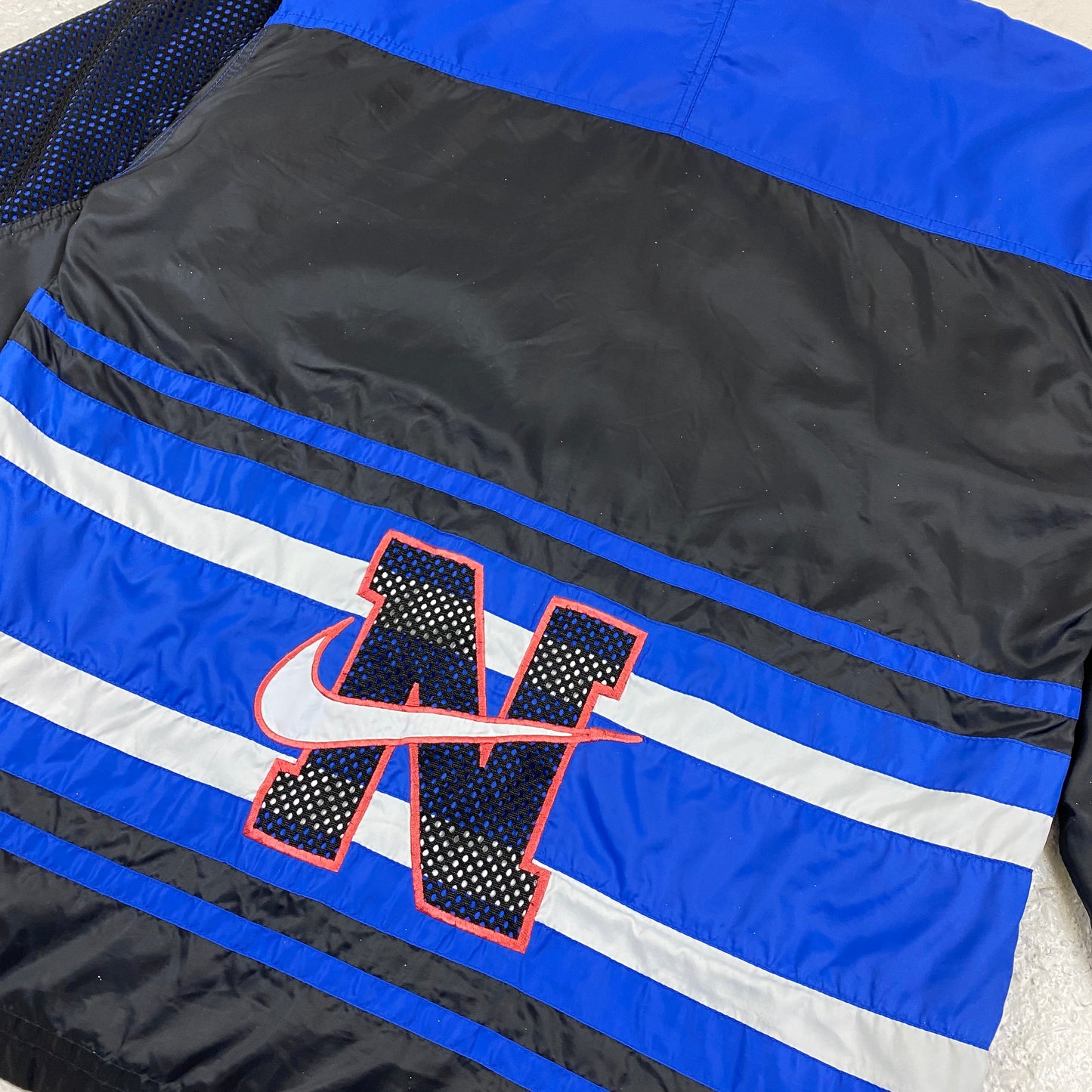 Nike RARE embroidered swoosh track jacket (M)