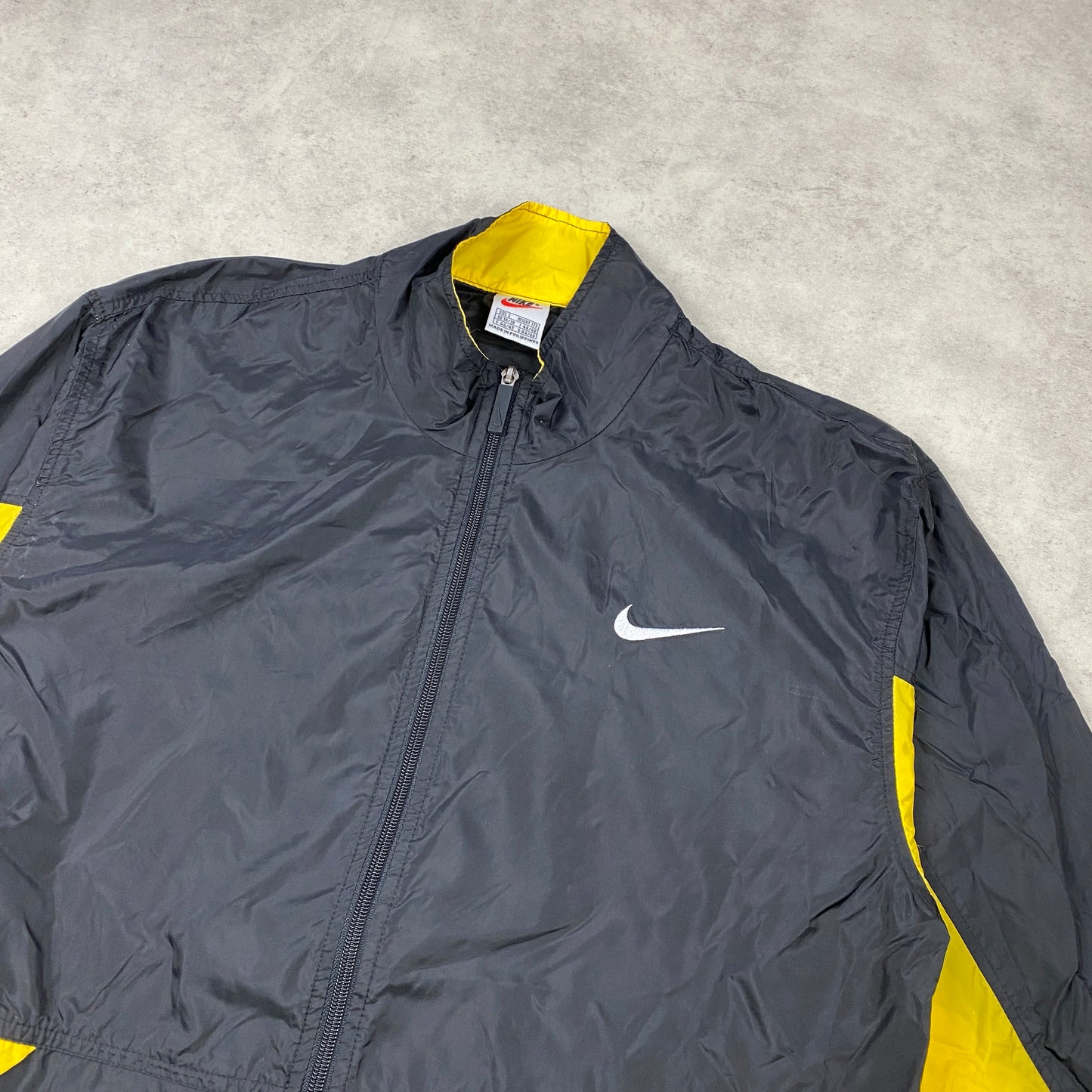 Nike track jacket (S-M)