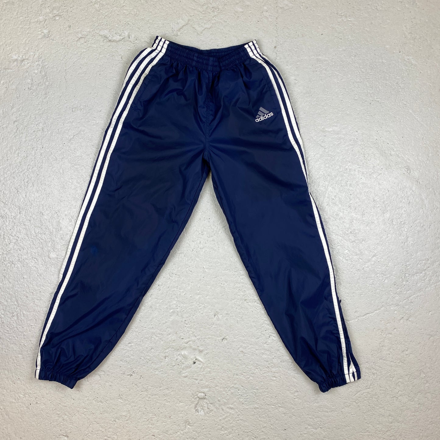 Adidas RARE embroidered track pants (S-M)
