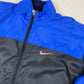 Nike RARE embroidered swoosh track jacket (M)